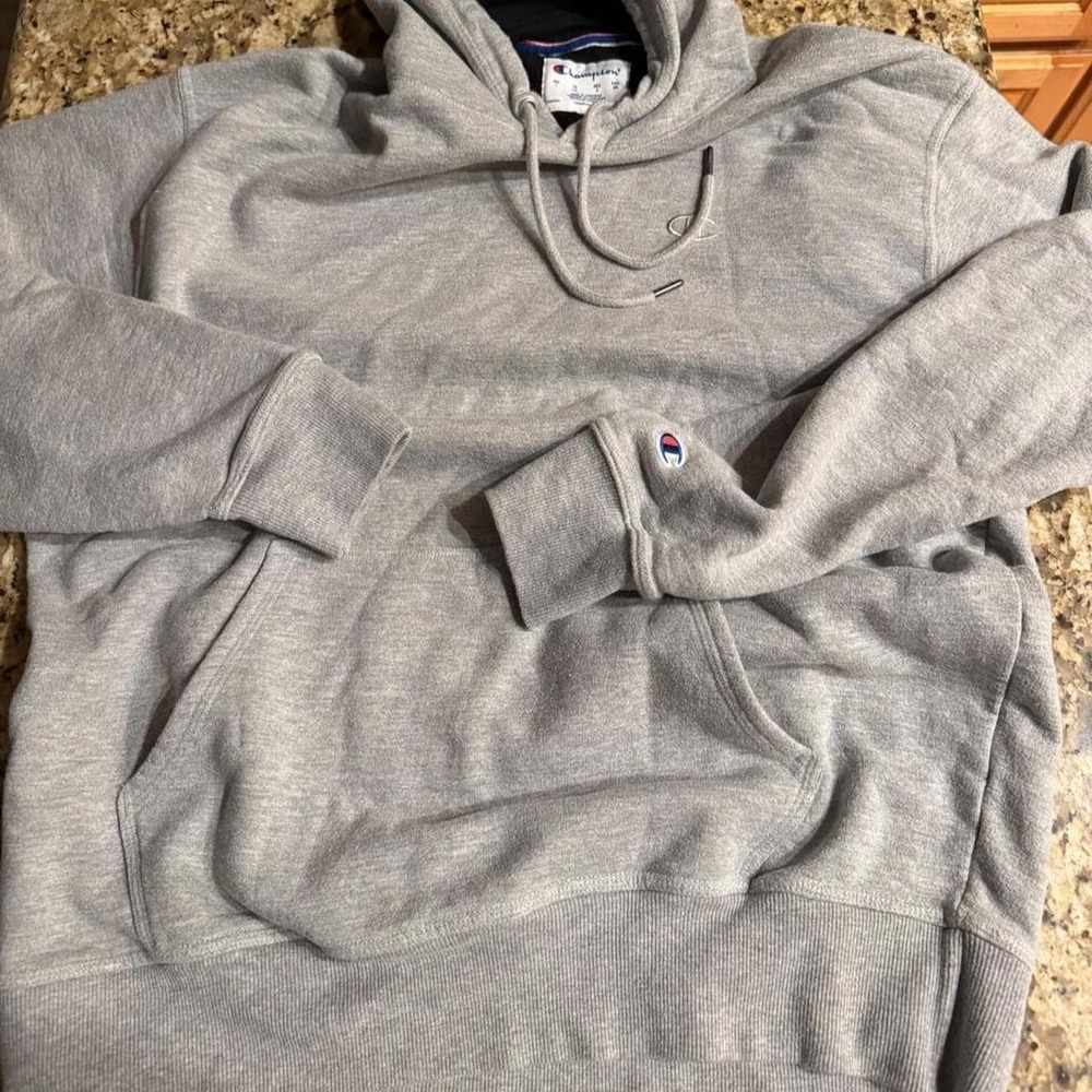 Gray pullover hoodie with embroidered Champion logo . Size Large Mens